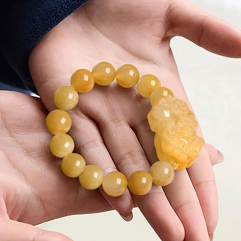Golden thread Jinsi Jade money bracelet with carving details shown in two size variations