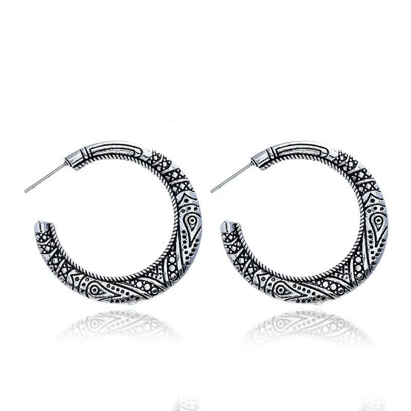 C-shaped alloy earrings with vintage engraving street shot design in bronze finish