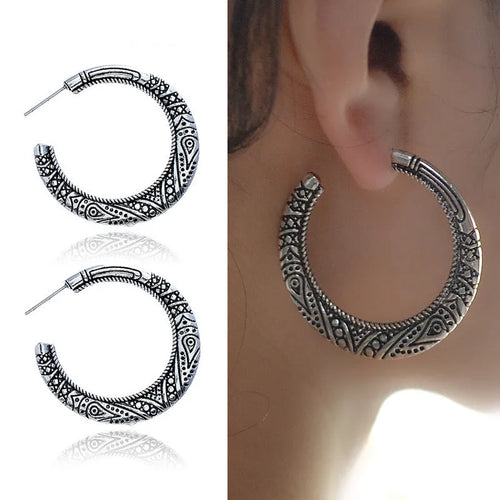 C-shaped alloy earrings with vintage engraving street shot design in bronze finish