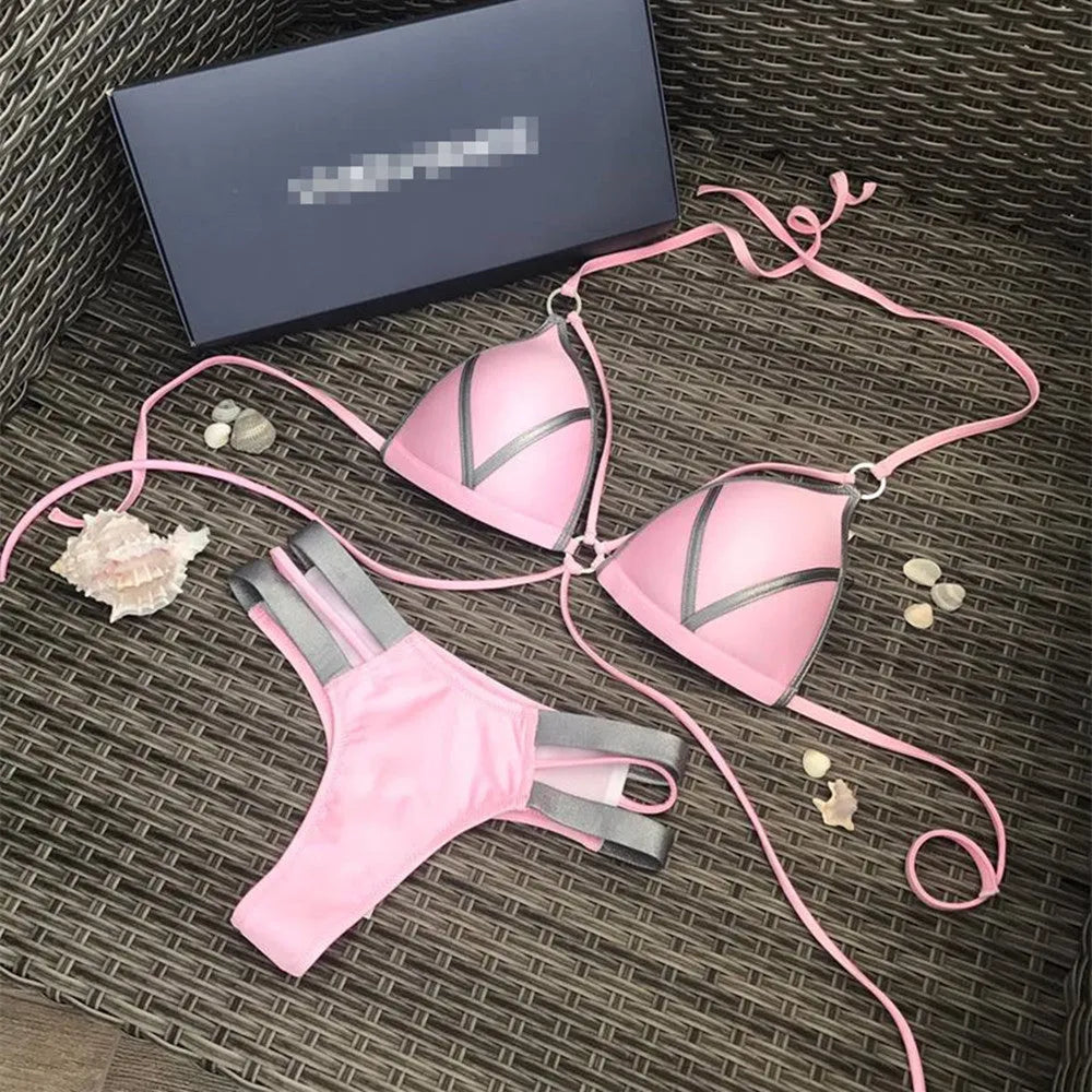 Women's bronzing bikini swimsuit with removable pads and cotton lining on a mannequin.