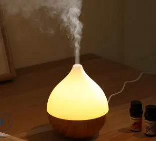 Asakusa wood grain finish vase-shaped ultrasonic aroma diffuser with 100ml water tank capacity.