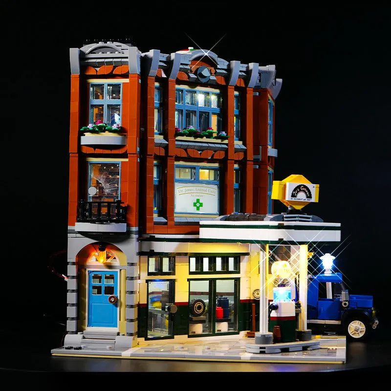Plastic LED lighting kit components for a MOC model corner repair shop diorama.