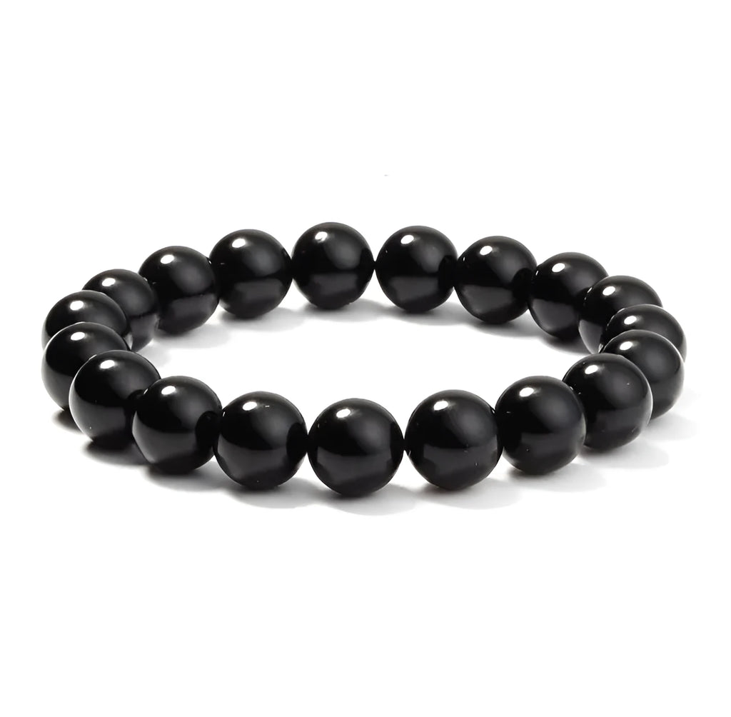 Geometric black agate stretch bracelet with 8mm beads on an elastic cord.
