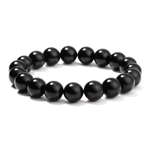 Geometric black agate stretch bracelet with 8mm beads on an elastic cord.