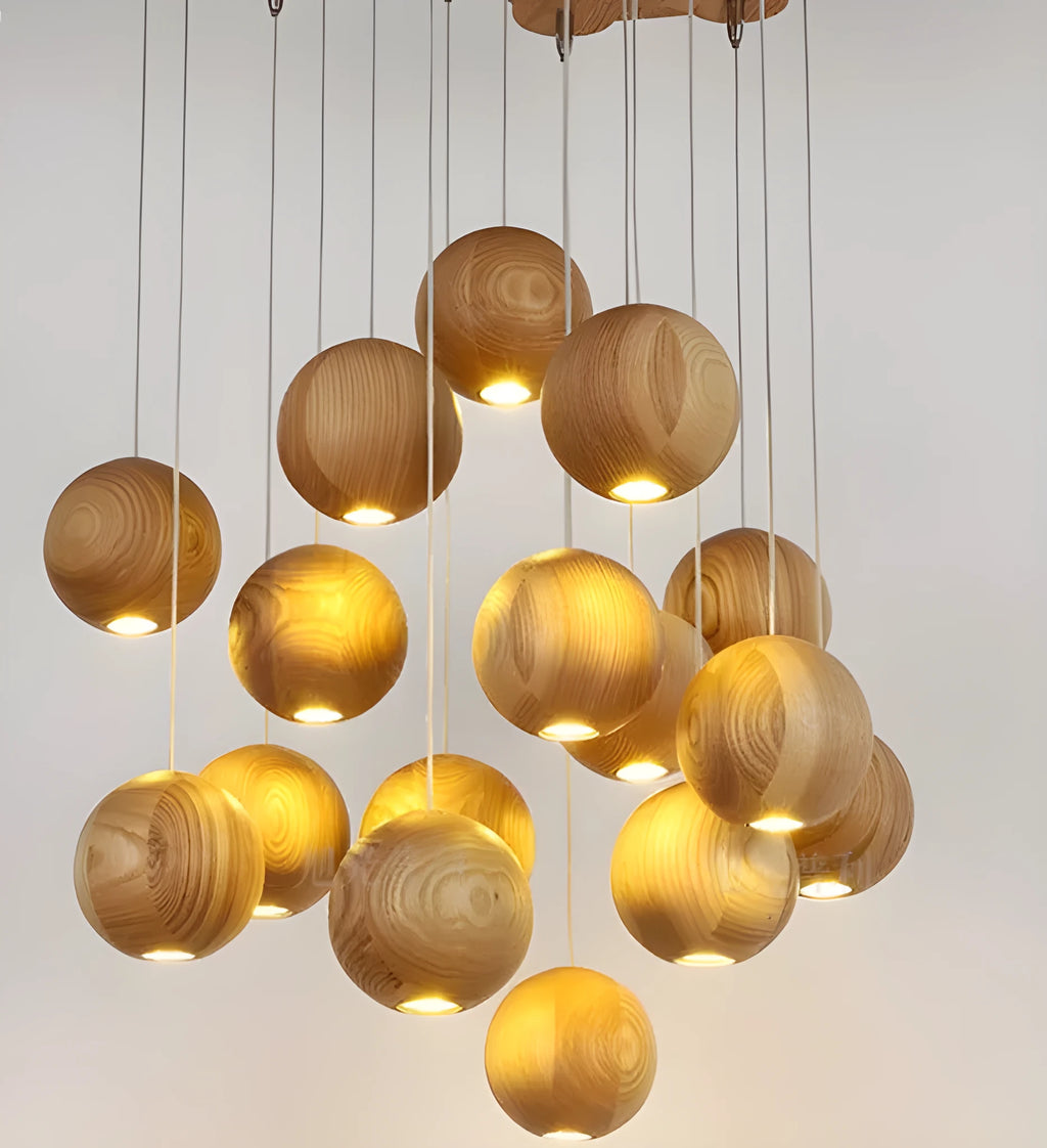 Nordic solid wood ball chandelier pendant light with wooden shade, shown in a living room setting.
