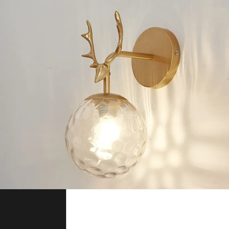 Modern round glass wall lamp with Nordic minimalist design on a wall.