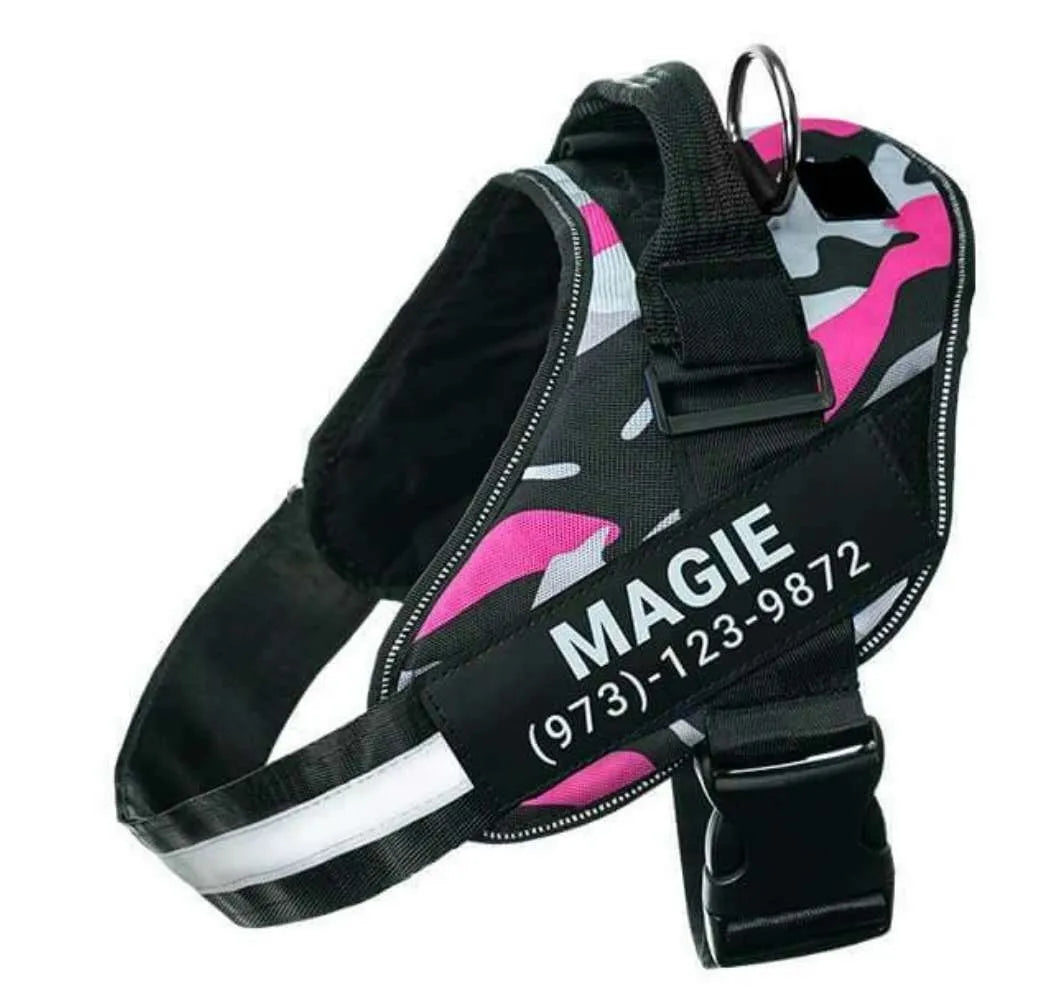 A reflective adjustable no-pull dog harness in a vest style, shown on a dog with a personalised patch.