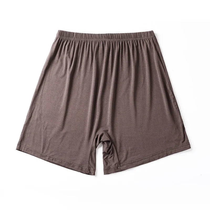 Men's solid colour high-waist boxer shorts made from modal fabric, shown in black, on a white background.