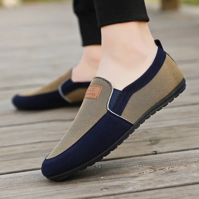 Men's grey and khaki canvas casual shoes with a round toe and rubber sole.
