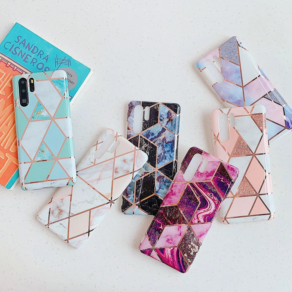 Glossy electroplated marble design TPU back cover case for a Huawei smartphone.