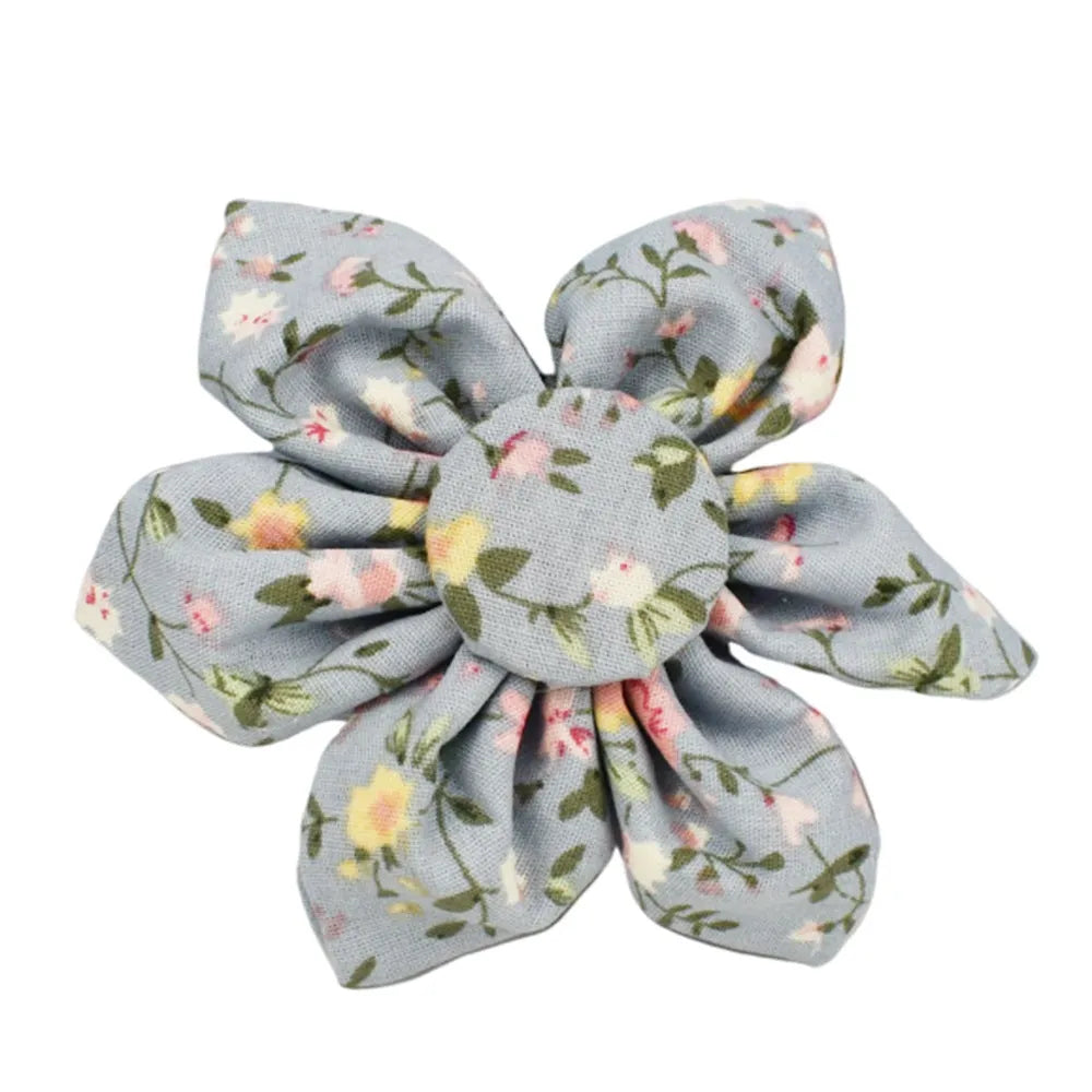 Blue floral pattern dog collar set with matching accessories including bow, leash and vest