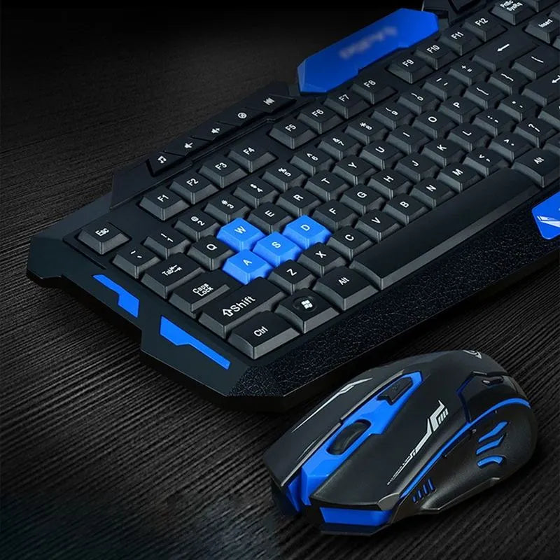 Black and blue wireless keyboard and mouse set on desktop