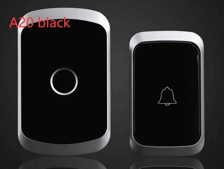 Wireless doorbell receiver plugged into a wall socket next to a battery-powered transmitter unit.