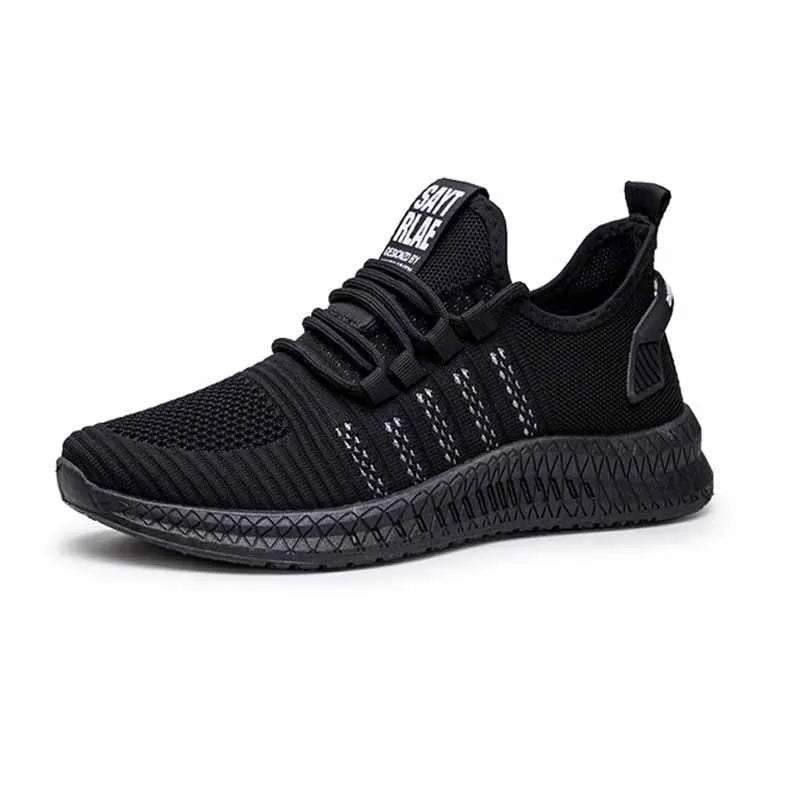 Men's black casual sports shoes with cross-strap detail and Flying Weave textured upper.