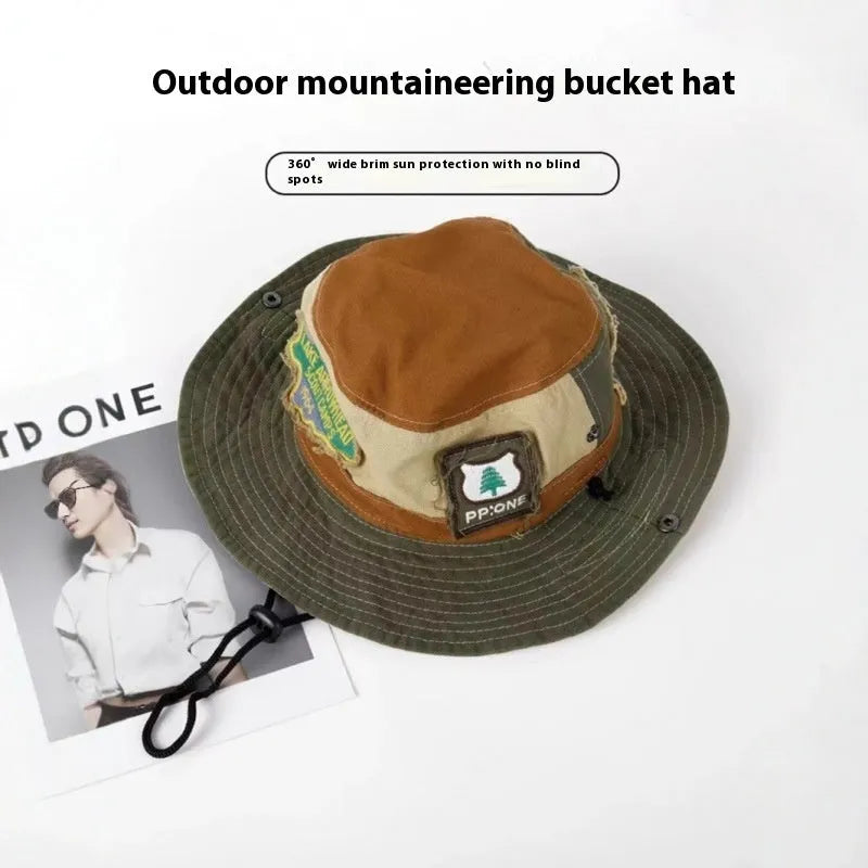 Army green cotton fisherman hat with patchwork detailing and flat top crown