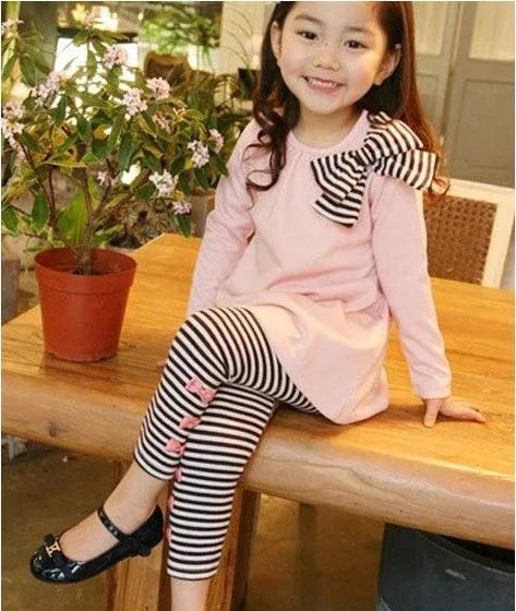 Pink cotton girls clothing set showing complete outfit in measured sizes