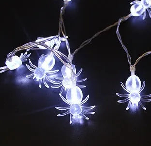 Halloween LED string lights with pumpkin, ghost, and bat pendants in multi-colour light mode