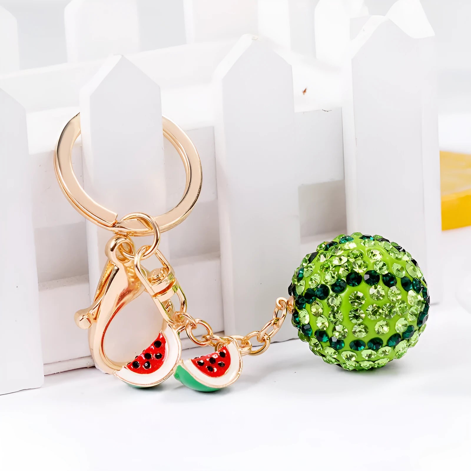 Green watermelon-shaped metal keychain measuring 12cm, made from zinc alloy
