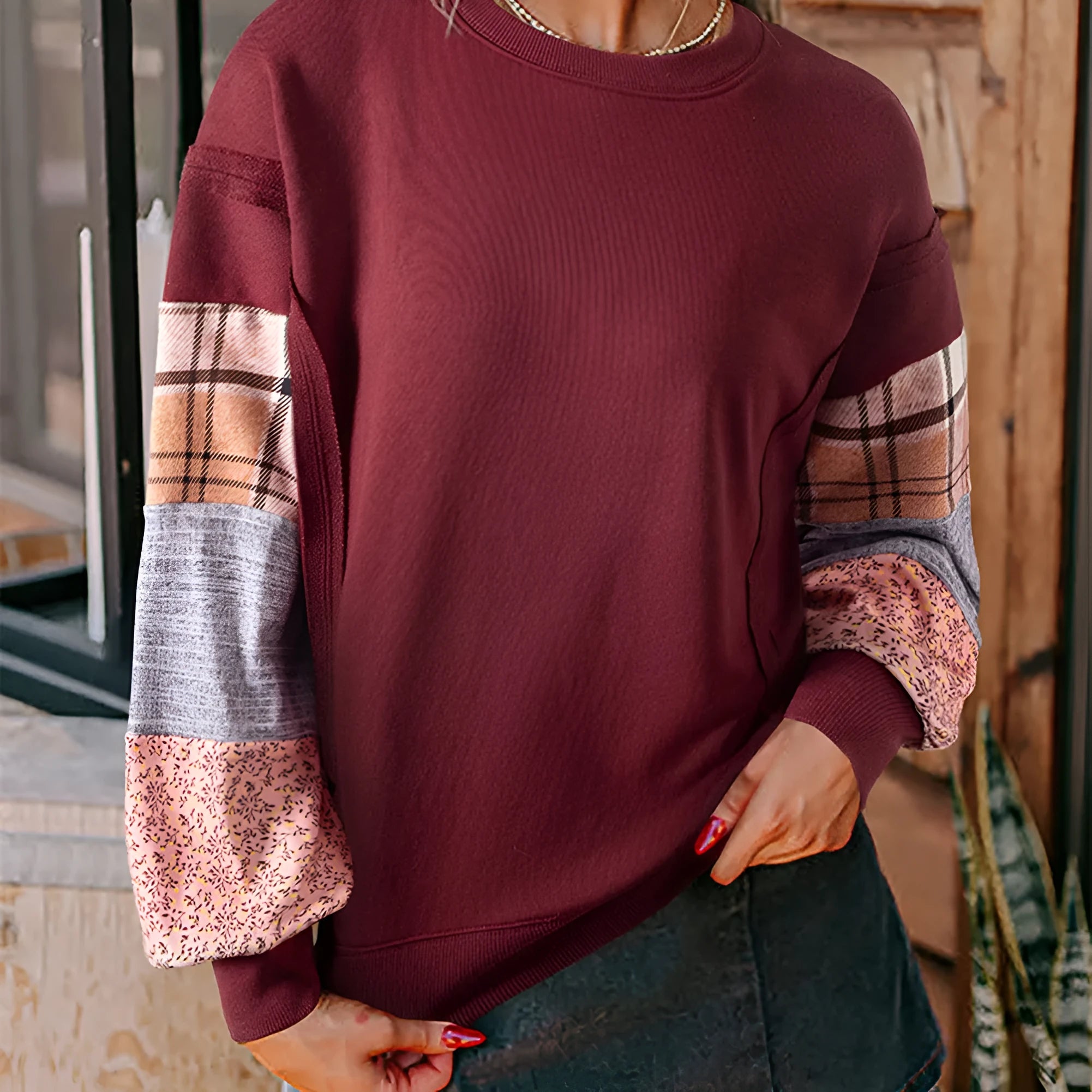 Women's loose plaid top with long sleeves in apricot colour showing Japanese-Korean casual styling