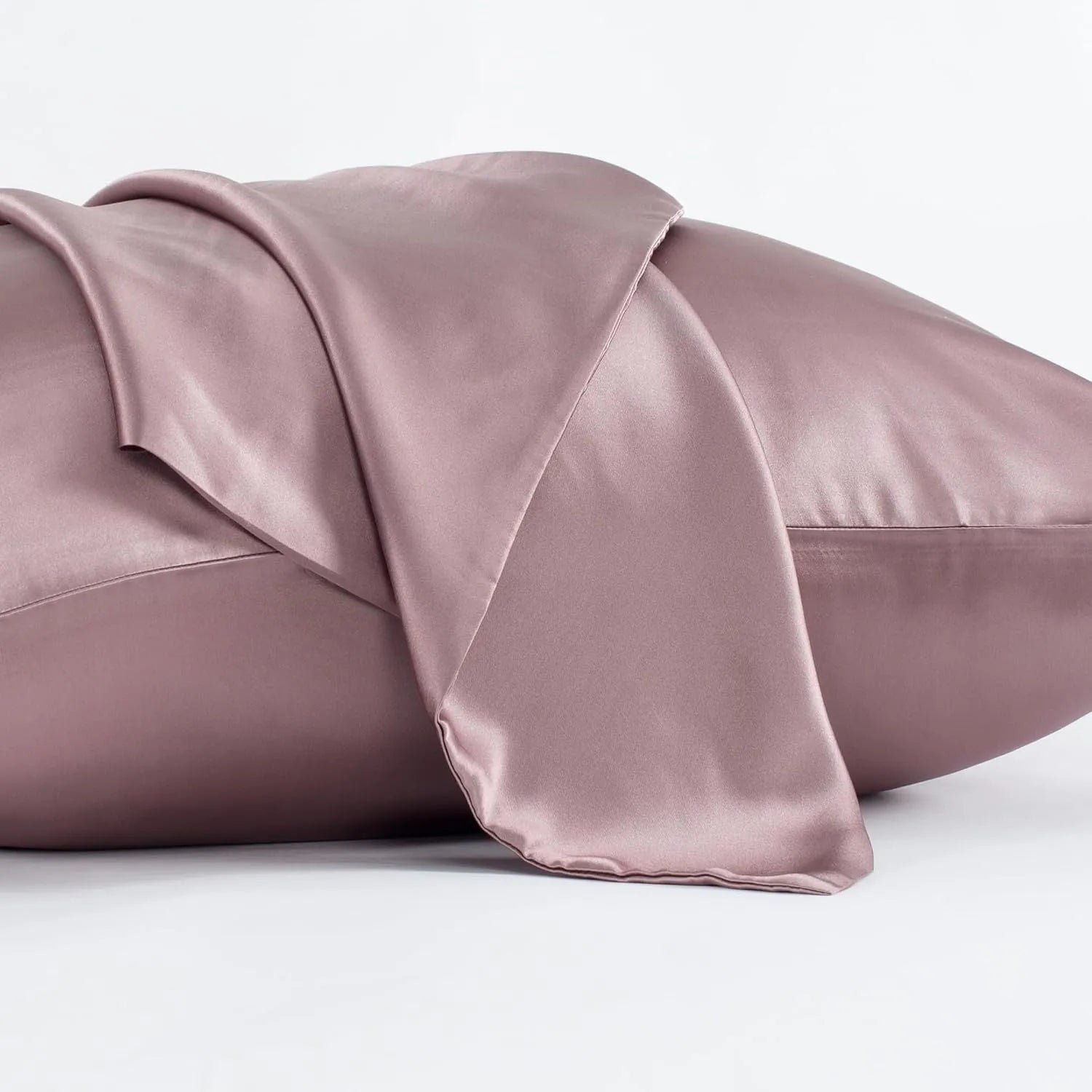 Dark grey 19 momme mulberry silk pillowcase with an envelope closure, laid flat.