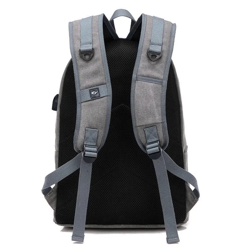 Canvas backpack with USB charging port shown in khaki colour