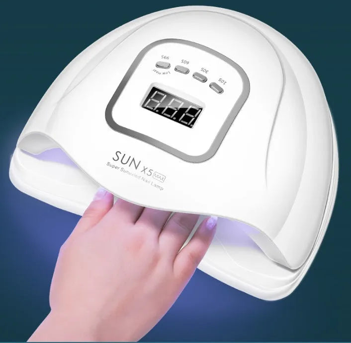 White nail polish curing lamp with UV and LED light sources for gel manicures