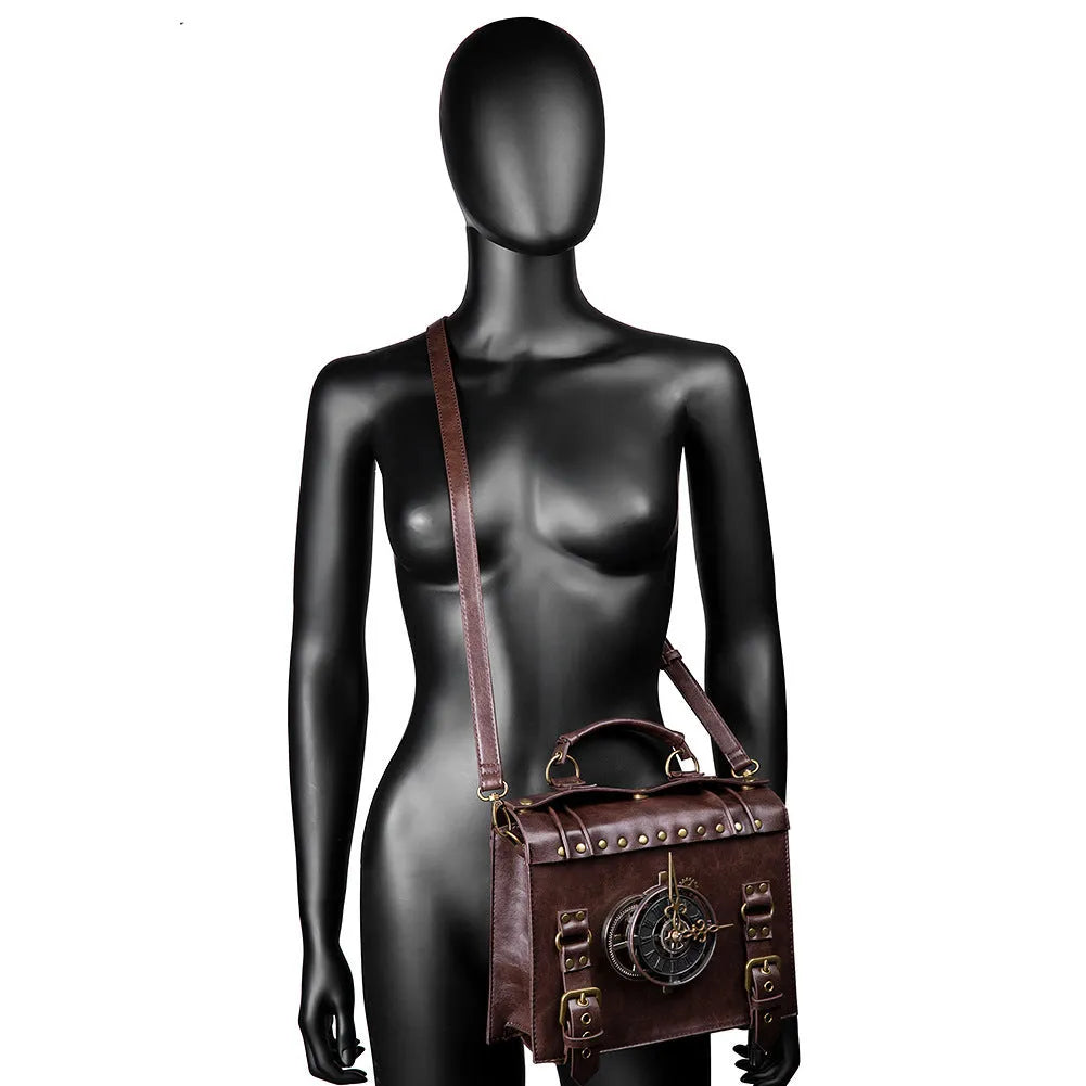 Bronze steampunk industrial retro style shoulder bag with metal details and pillow shape.