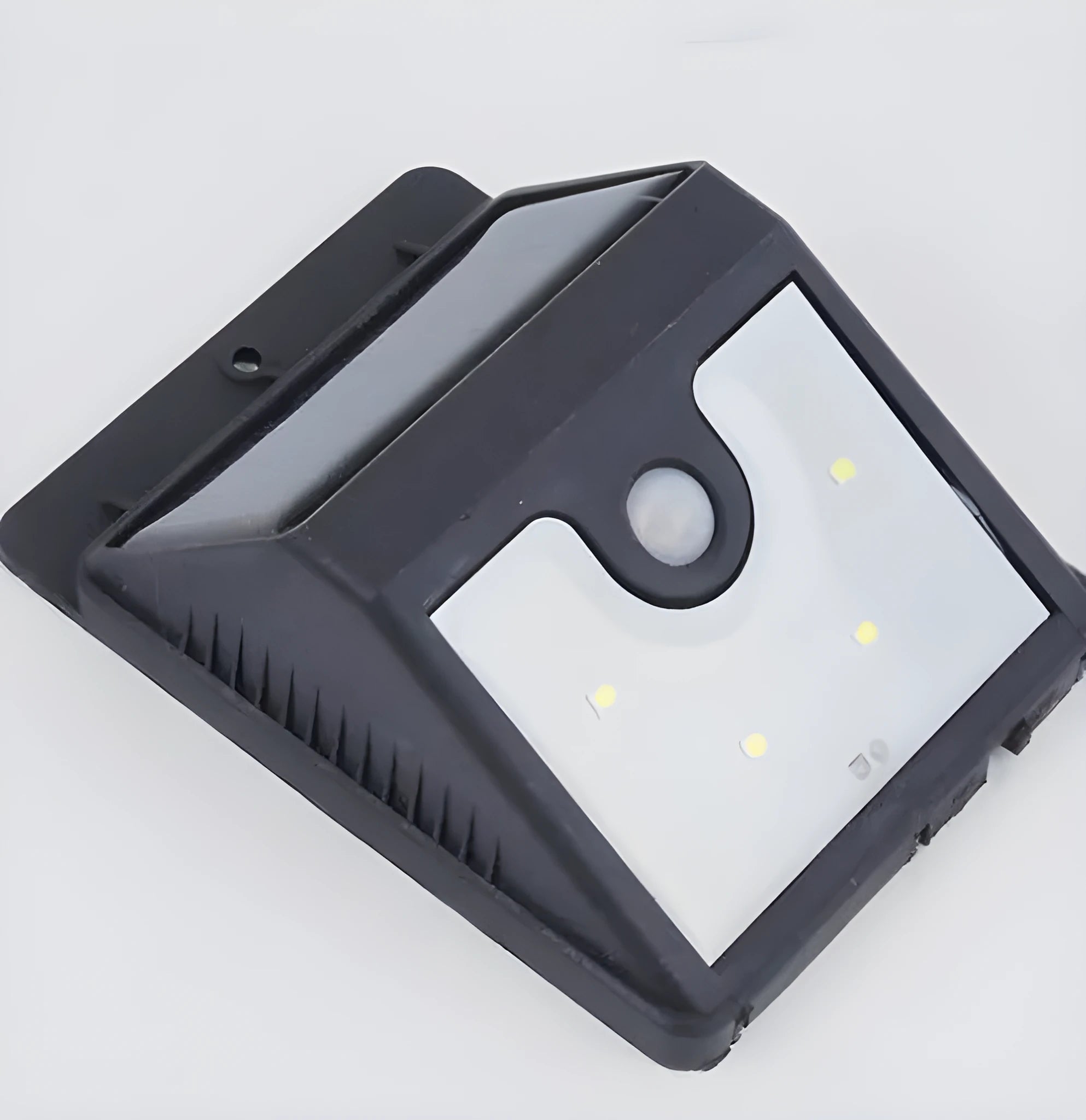 Four white solar-powered LED sensor lights for outdoor wall or garden installation.