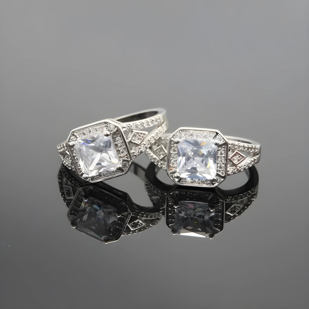 Women's platinum-coloured hollow geometric ring with quadrilateral ornament design and inlaid zircon stones