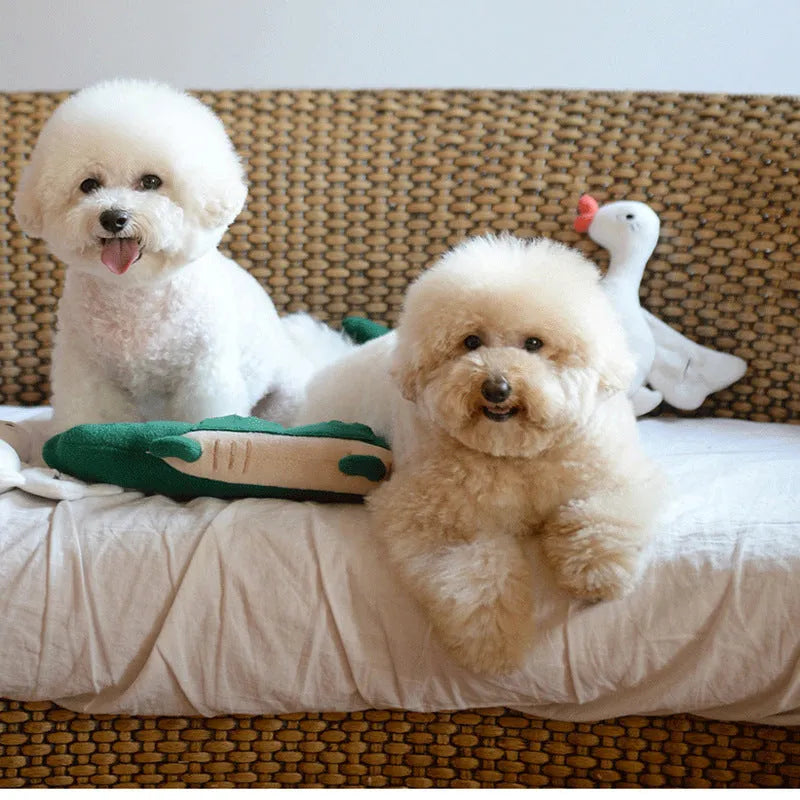 Green plush toy dog soft animal companion measuring 35cm by 18cm