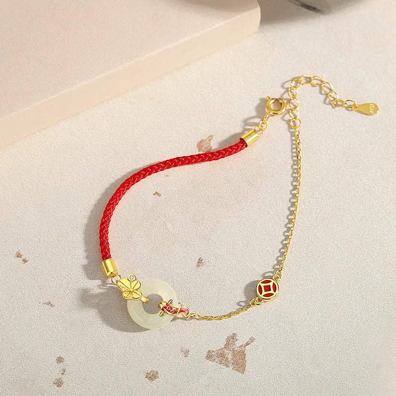 Koi peace buckle hetian jade red rope bracelet in 925 silver with gold electroplated finish
