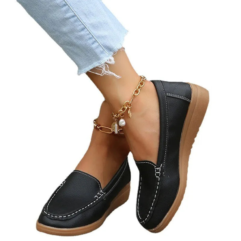 Women's flat loafer shoes in PU leather with a round toe and rubber sole, shown in multiple colours.