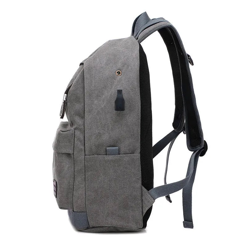 Canvas backpack with USB charging port shown in khaki colour