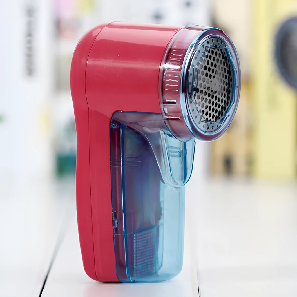 Portable electric lint remover for clothing on a white background