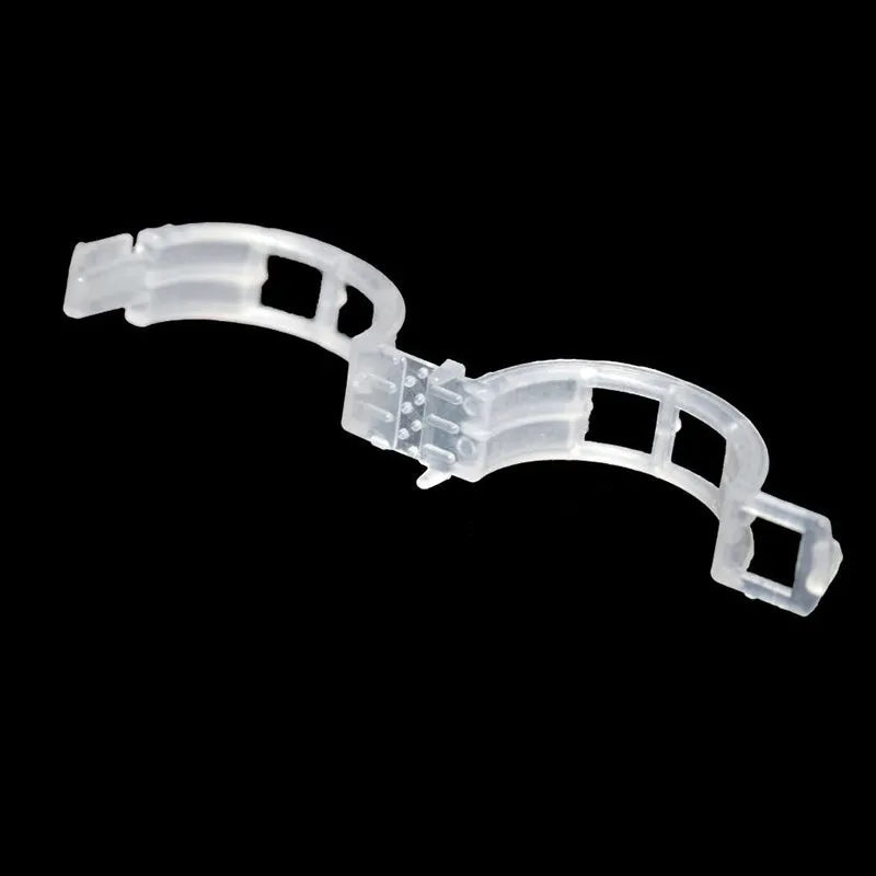 Pack of 50 plastic tomato plant grafting clips for garden use.