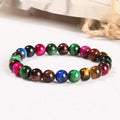 Women's colourful tiger eye stone bracelet with round beads on a string, showing size options.