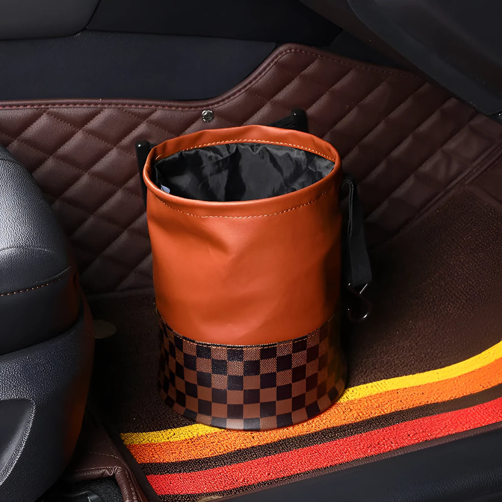 Retractable leather car interior trash can with carry handle in colour as shown.