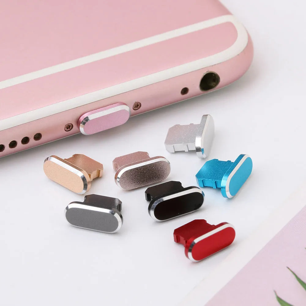 Aluminium alloy charging port dust plug for iPhone in various colours including gold, silver, blue, and rose gold.