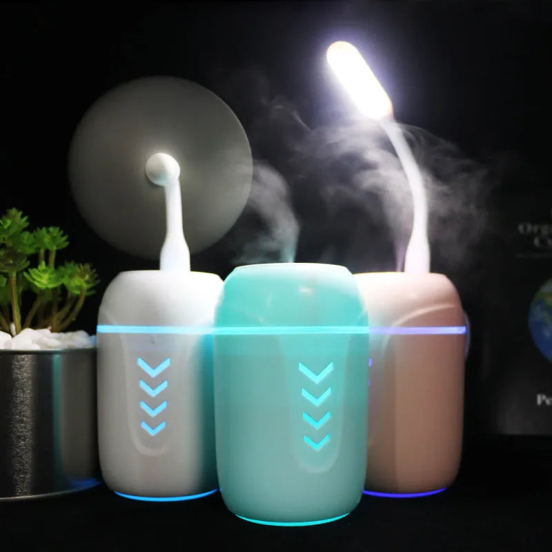 Portable columnar car humidifier with mechanical controls and USB cable in blue colour