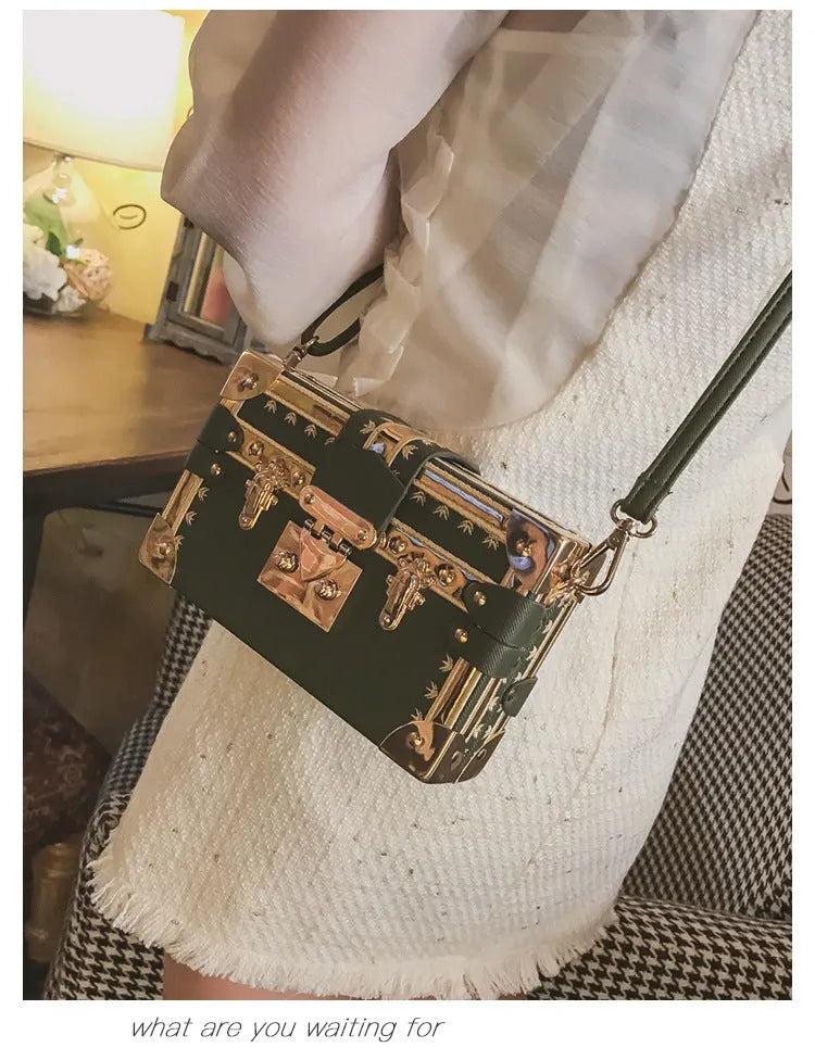Women's hard black PU leather shoulder bag with flap closure and rivet decoration