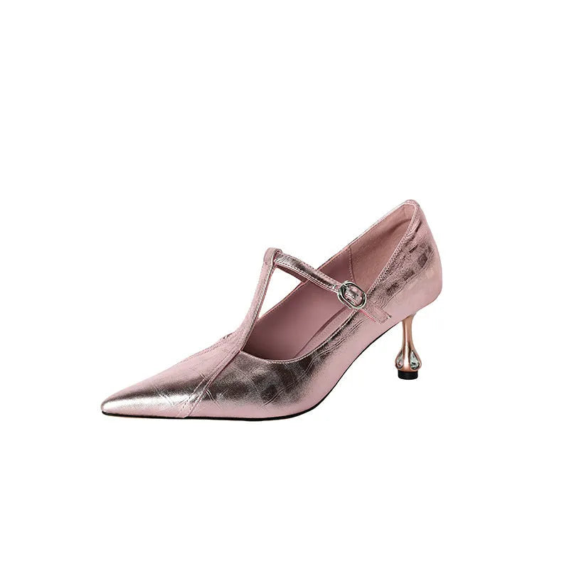 Women's gun coloured leather Mary Jane pumps with a chunky mid heel and pointed toe on a white background.