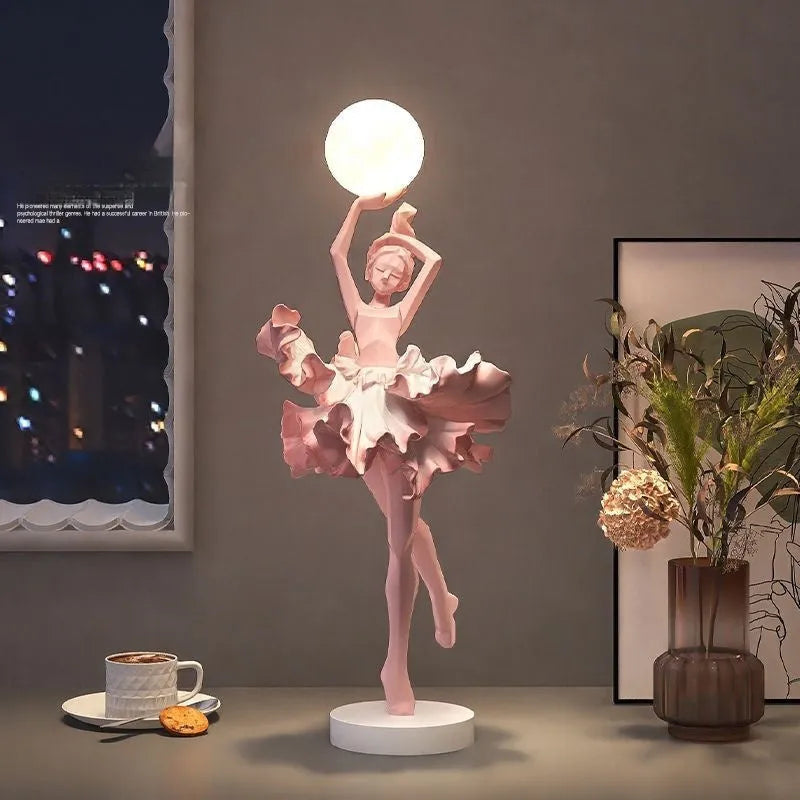 Small modern resin night lamp with USB charging port in black gold colour.