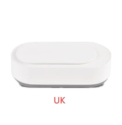 White portable ultrasonic cleaning machine with stainless steel tank for jewellery and glasses.