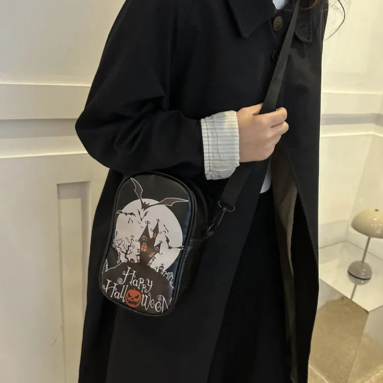 Halloween graffiti print crossbody bag showing pumpkin, ghost and bat designs in medium 14x23x9.5cm size