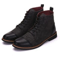 Men's black leather motorcycle boots with visible belt buckle detailing and a thick rubber sole