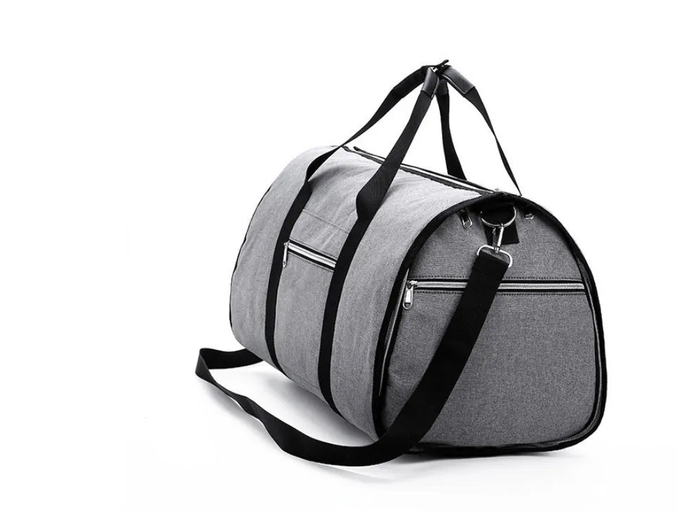 Medium-sized cylindrical travel bag in Oxford cloth, shown in one of four colours: black, blue, light grey, or red.