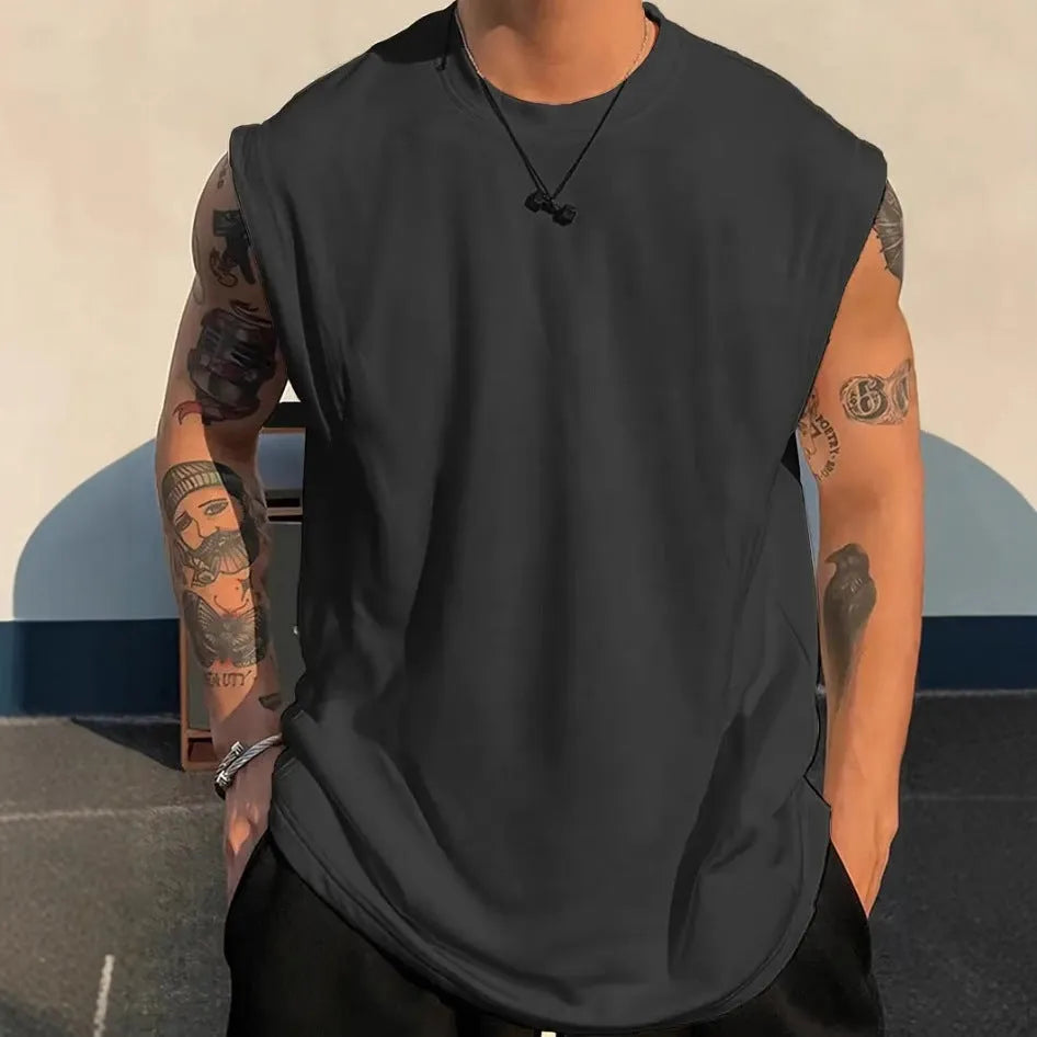 Men's loose cotton tank top in solid colours showing sleeveless design and straight hem