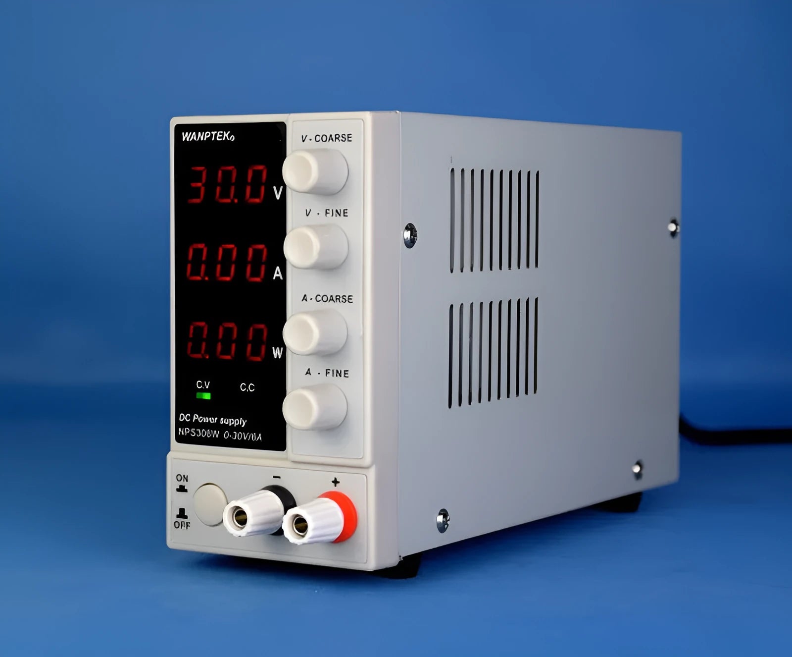 White S605W adjustable laboratory DC power supply with voltage and current control dials.