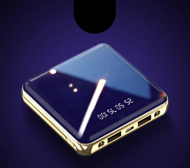 Blue cylindrical aluminium shell mini power bank showing multi-USB ports on a white background.