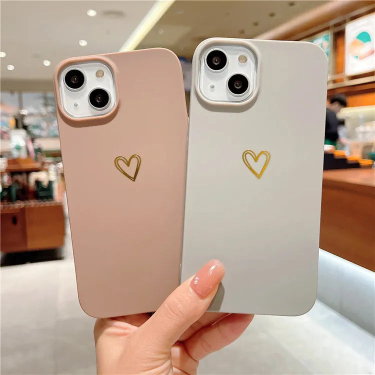 Brown silicone iPhone case with a hot-stamped love heart design on the back